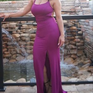 Winsor long purple Cris cross in the back amd front slit stretchy gown size S